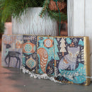 Four wood blocks created by The Flipped Piece feature Belles & Whistles' Nordic Noel rice paper on them.