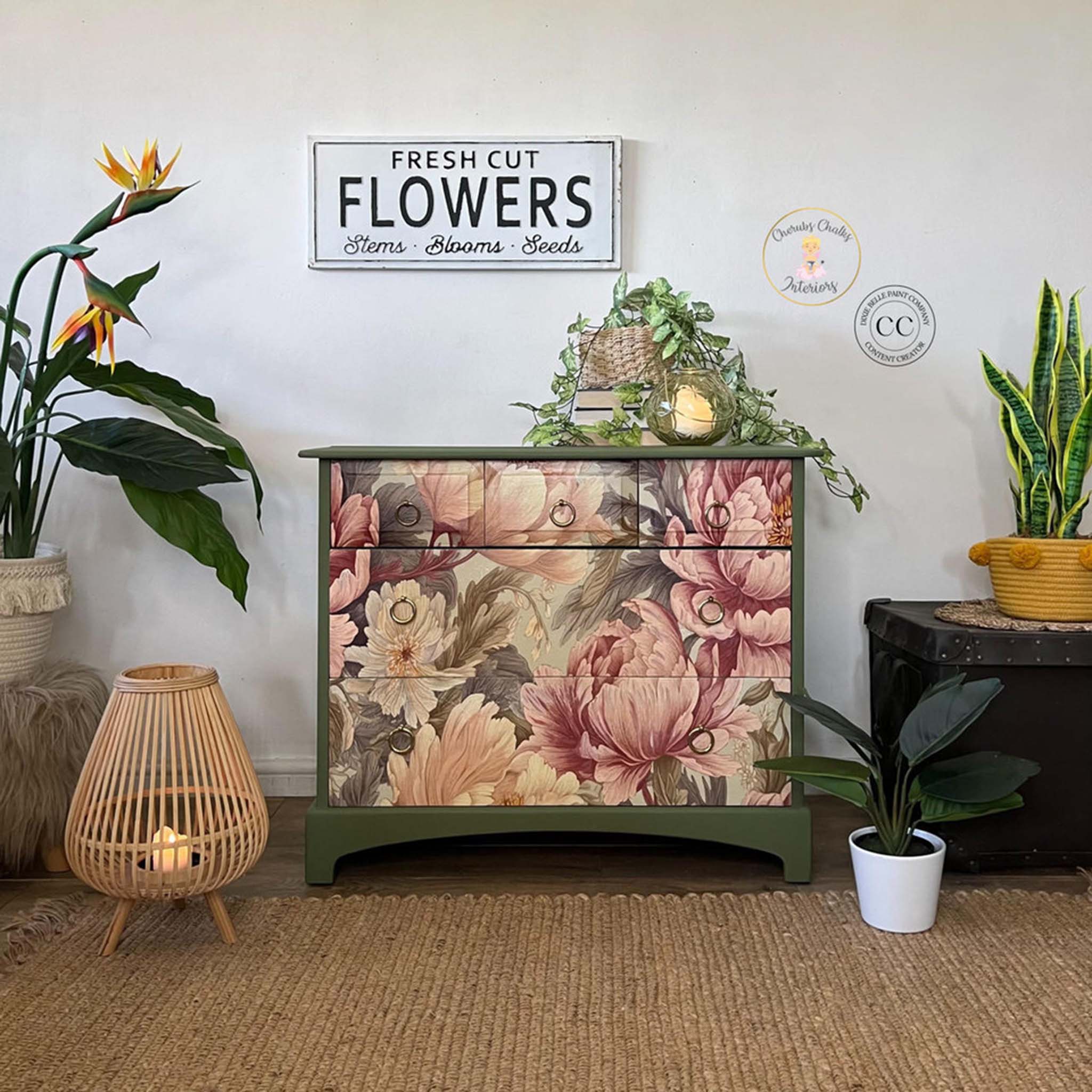 A 5-drawer dresser refurbished by Cherub's Chalks Interiors is painted olive green and features Belles & Whistles' Peaceful Peonies A1 rice paper on the drawers.