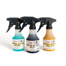 Three 8oz bottles of Dixie Belle Paint's Patina Spray in Green, Blue, and Yellow are against a white background.