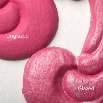 Close-up view of a pink colored silicone mould casting that shows the before and after use of Dixie Belle's Pearlescent Glaze.