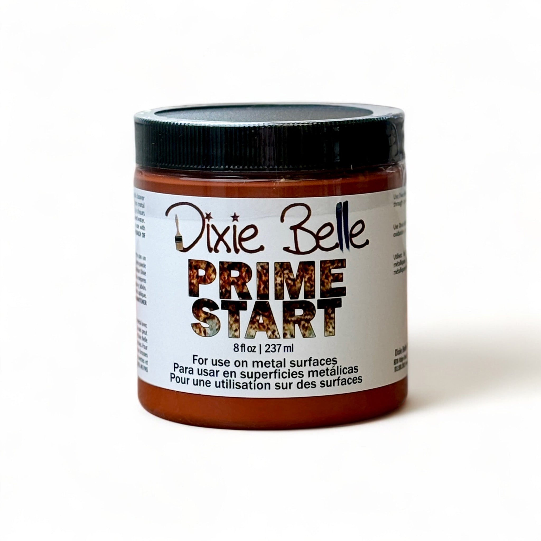 An 8oz container of Dixie Belle Paint Company's Prime Start is against a white background. This product is a protectant when using Patima products over metal.