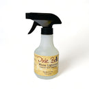 An 8 ounce spray bottle of Dixie Belle Paint's White Lightning Cleaner and Degreaser is against a white background.