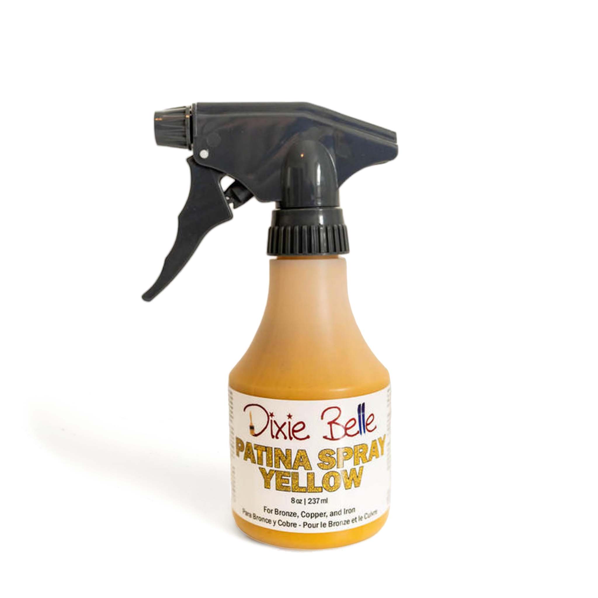 An 8oz spray bottle of Dixie Belle Paint Company's Patina Spray in Yellow is against a white background.