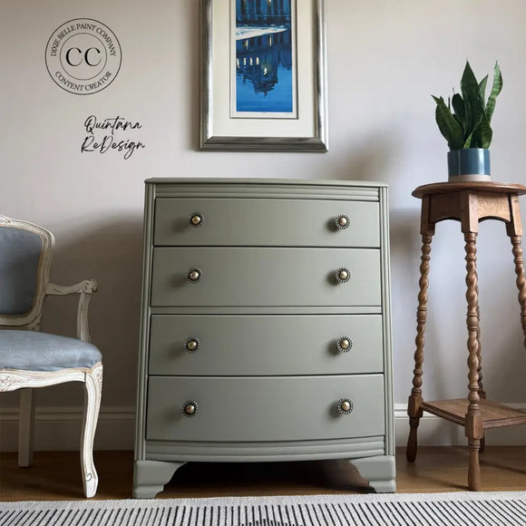 Gray dresser with decorative elements in a room setting