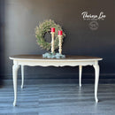 A vintage coffee table refurbished by Theresa Lee features Dixie Belle's Glacier Silk All-In-One Mineral Paint.