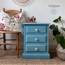 A vintage 3-drawer night stand refurbished by Faff Design features Dixie Belle's Harbor Silk All-In-One Mineral Paint.