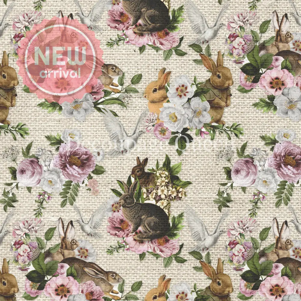 Close-up of a rice paper featuring a burlap background adorned with playful rabbits, delicate floral bouquets, and charming doves.