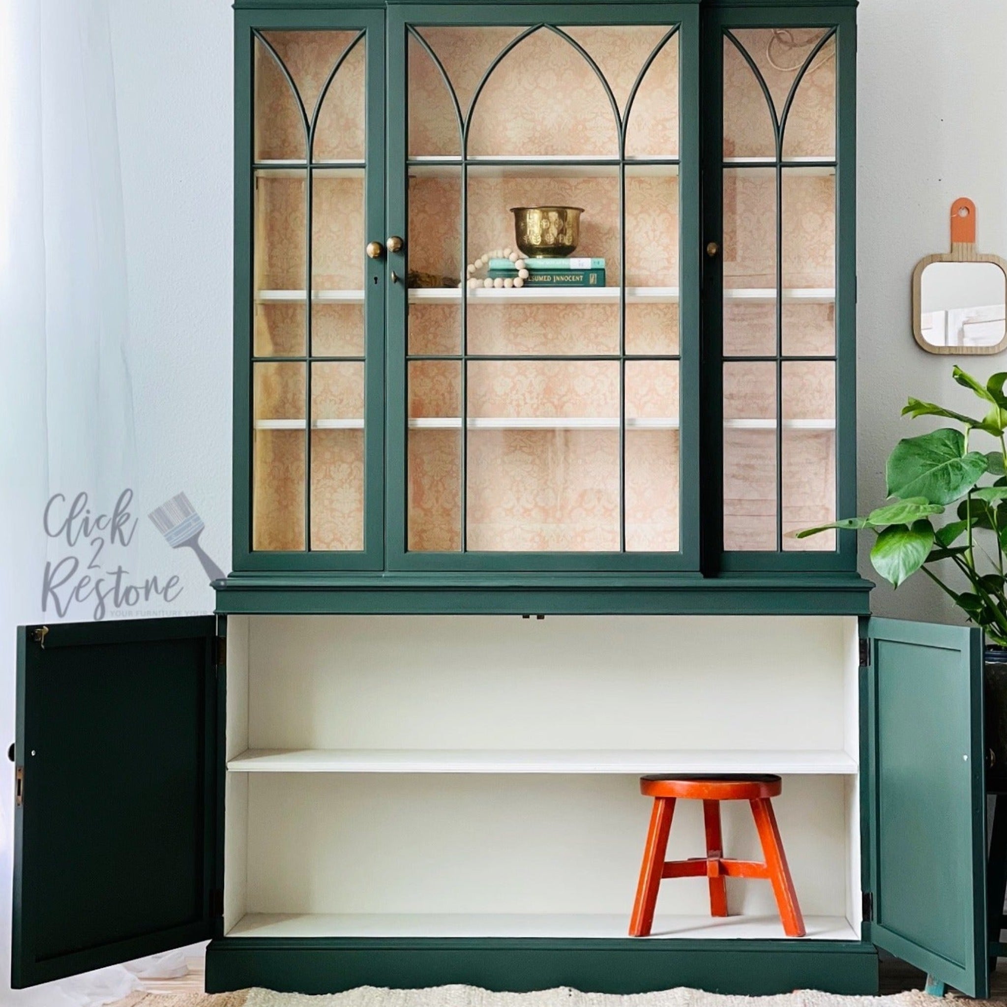 A large hutch refurbished by Click 2 Restore is painted green and features ReDesign with Prima's Peach Damask tissue paper on the inside of the hutch top.