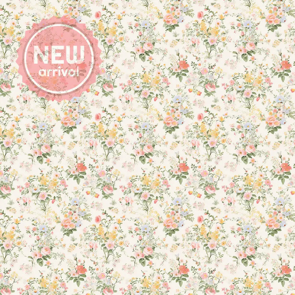 Close-up of a rice paper design that features a print of pale yellow, pink, and blue bouquets against a soft cream background.