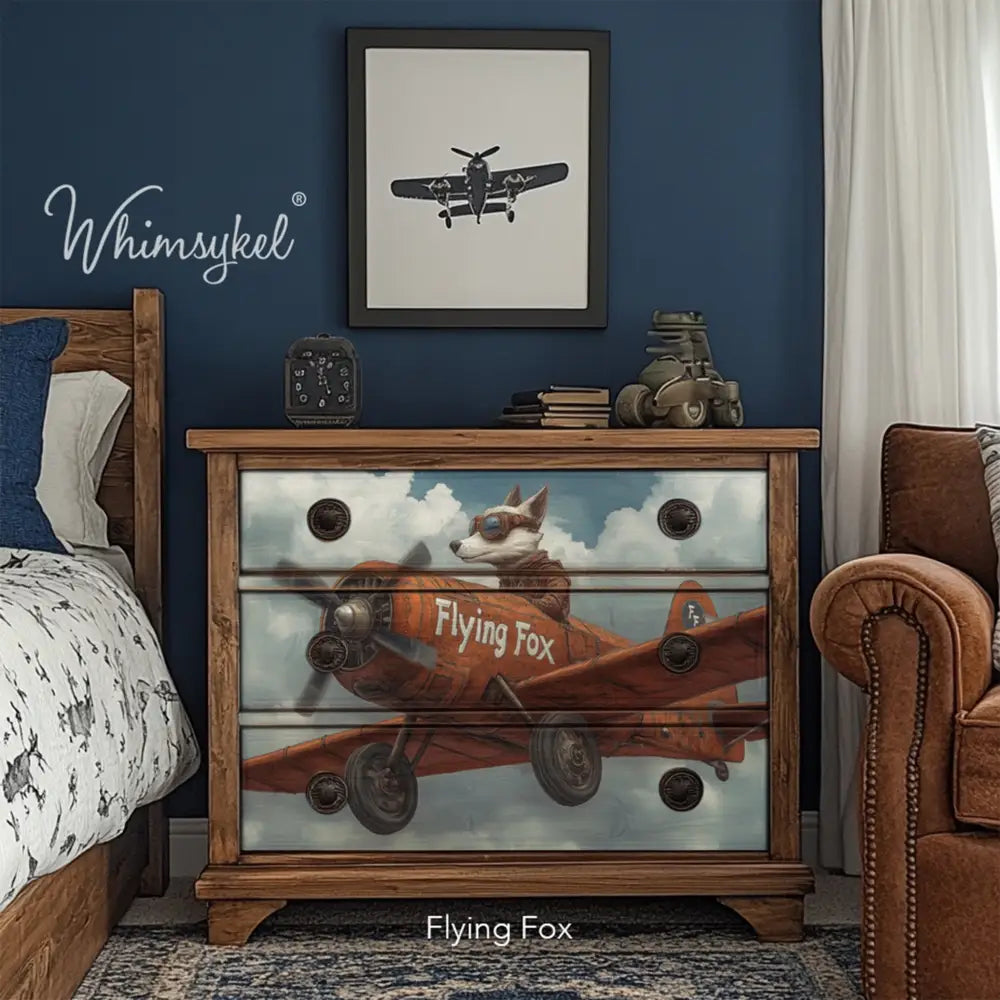 A wood 3-drawer dresser in a boys room features Whimyskel's Flying Fox tissue paper on the front.