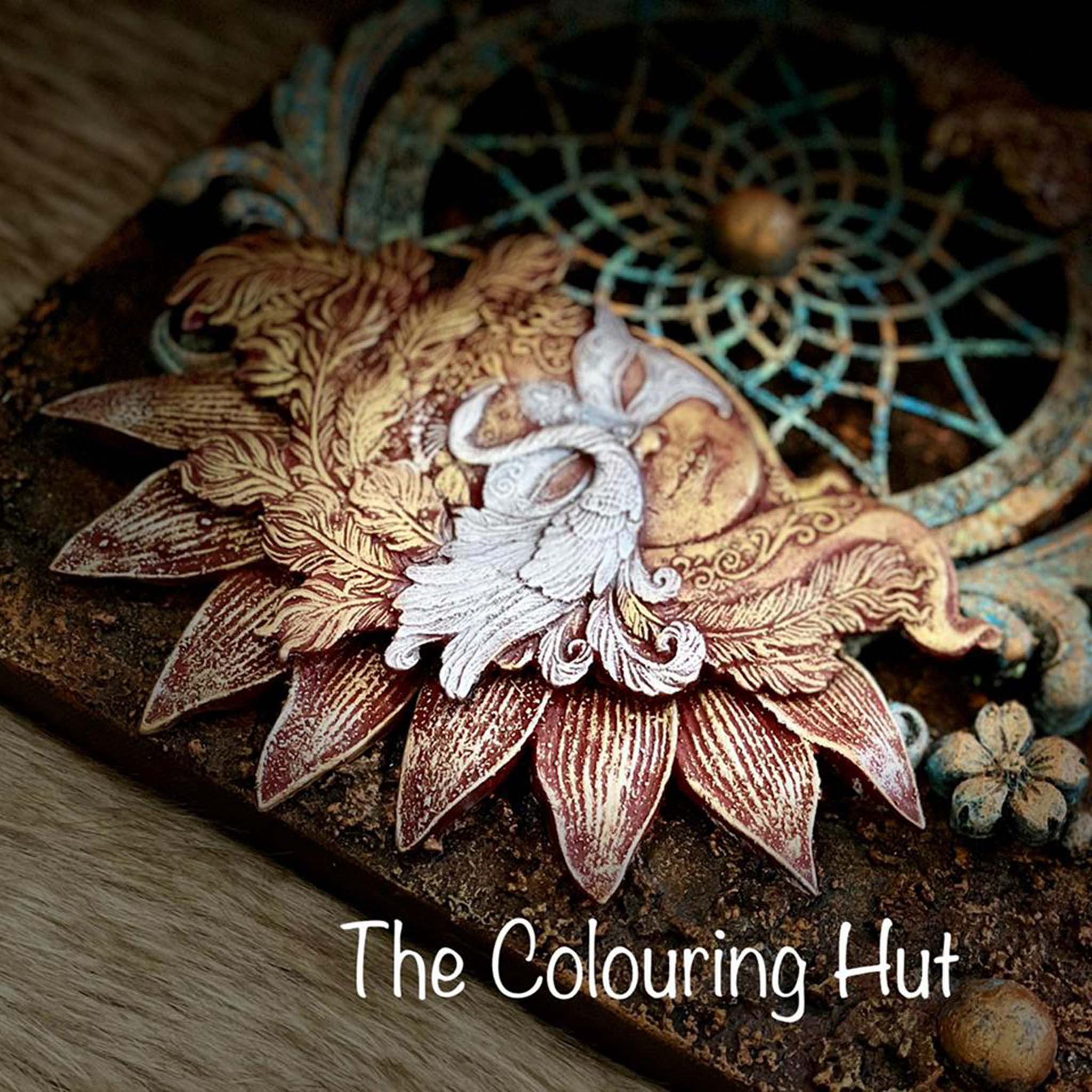 A wood craft created by The Colouring Hut features a dream catcher and a color casting of Get Inspired by Dadarkar Art's Caribbean Princess silicone mold.