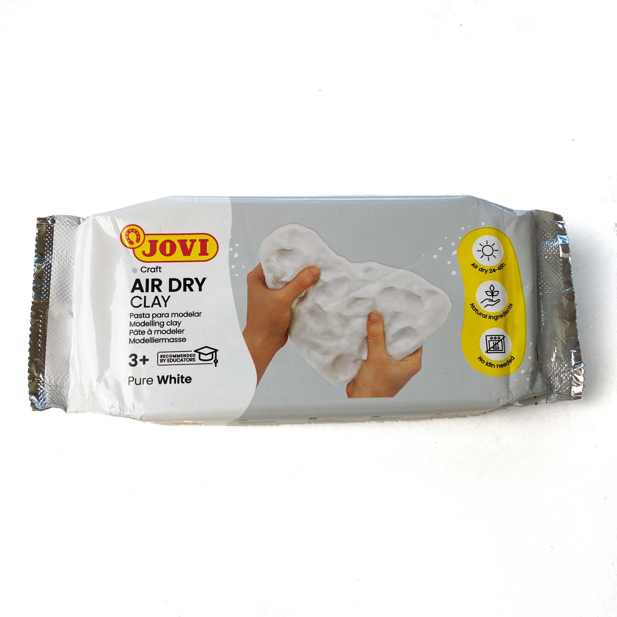 A package of Jovi's Craft Air Dry Clay in Pure White is against a white background. Jovi Air Dry Clay air dries in 24-48 hours, is made of natural ingredients, and no kiln is needed.