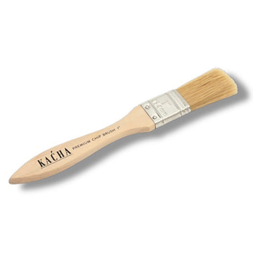 A 1-inch wood handle chip brush by KACHA is against a white background.