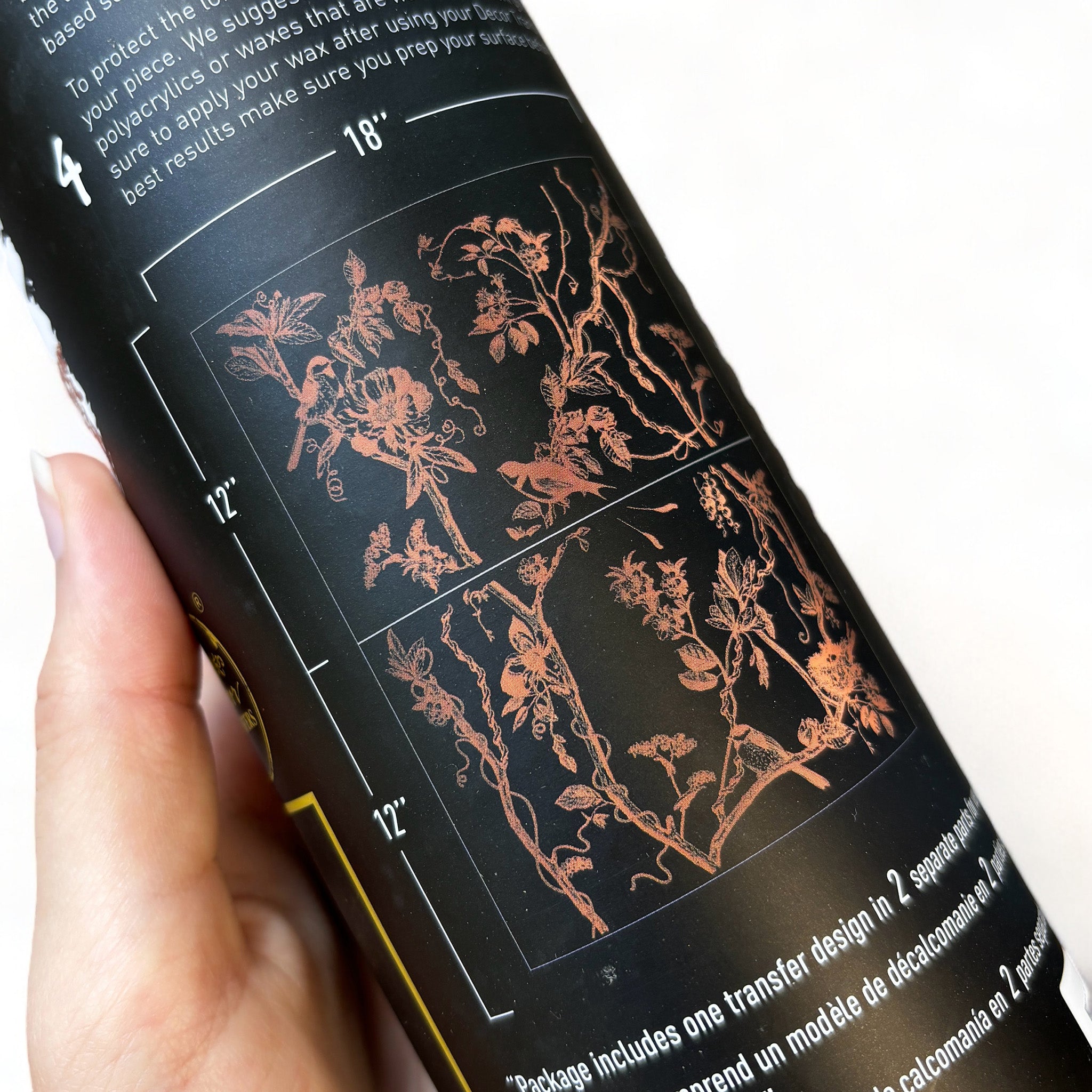 A tube of ReDesign with Prima's Kacha Bird Watching copper foil rub-on transfer shows 2 sheets with measurements of 18" x 12" each.