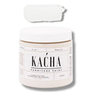 A 16 oz container and swatch sample of Kacha Furniture Paint in the color Azucar (white) is against a white background.