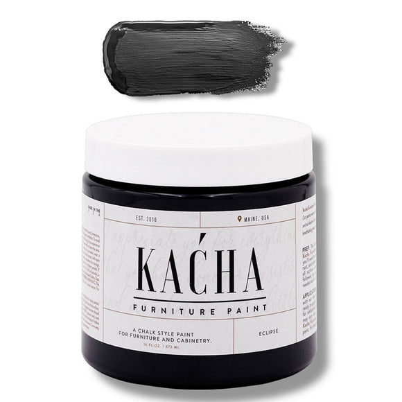 A 16 oz container and swatch sample of Kacha Furniture Paint in the color Eclipse (true black) is against a white background.