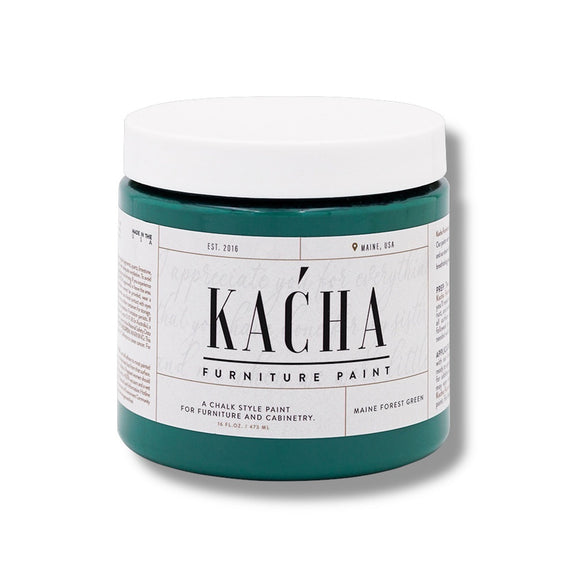 A 16 oz container of Kacha Furniture Paint in the color Maine Forest Green is against a white background.
