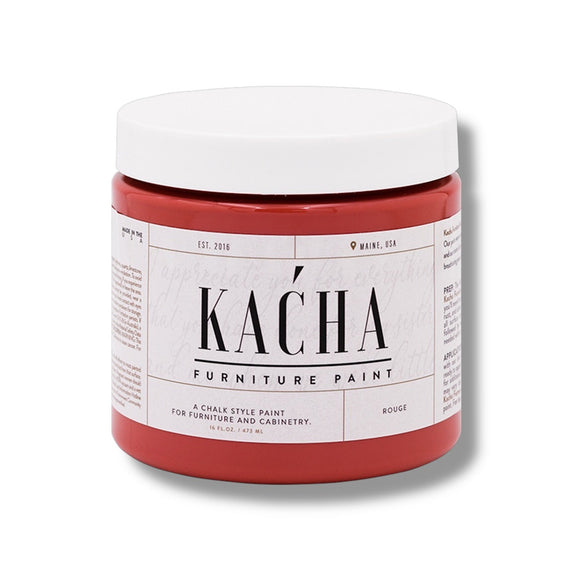 A 16 oz container of Kacha Furniture Paint in the color Rouge (warm red with brown undertones) is against a white background.