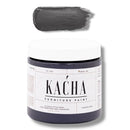 A 16 oz container and swatch sample of Kacha Furniture Paint in the color Shadow Grey (charcoal) is against a white background.