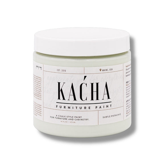 A 16 oz container of Kacha Furniture Paint in the color Subtle Pistachio (pale green) is against a white background.