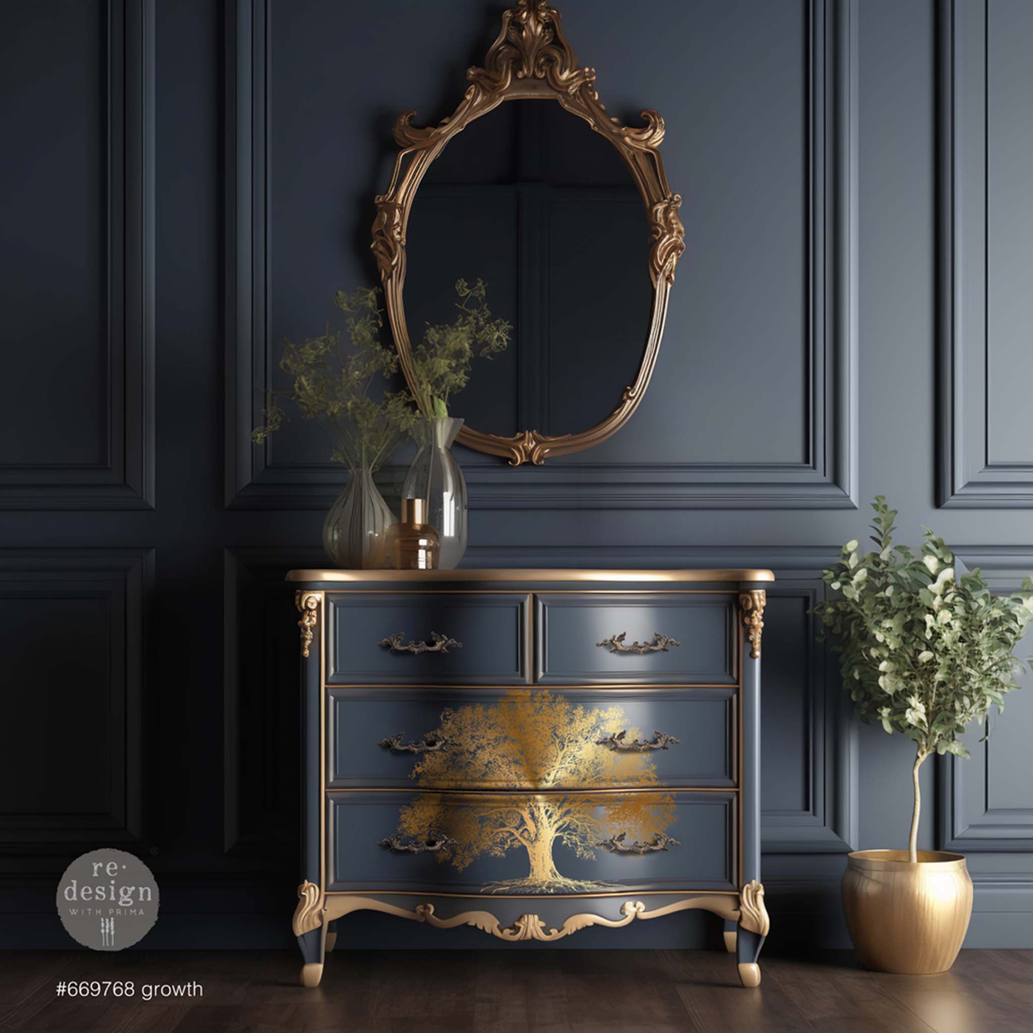 A vintage 4-drawer dresser is painted blue with gold accents and trim and features ReDesign with Prima's Growth Gold Foil transfer by Kacha in the center of the bottom 2 drawers.