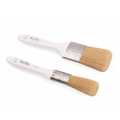 Two Kacha paint brushes, a 1-inch and a 2-inch, with synthetic fiber bristles, are against a white background.