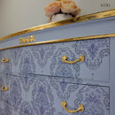 Close-up of blue damask pattern on drawers applied with KACHA Dana Damask rub-on transfer for furniture