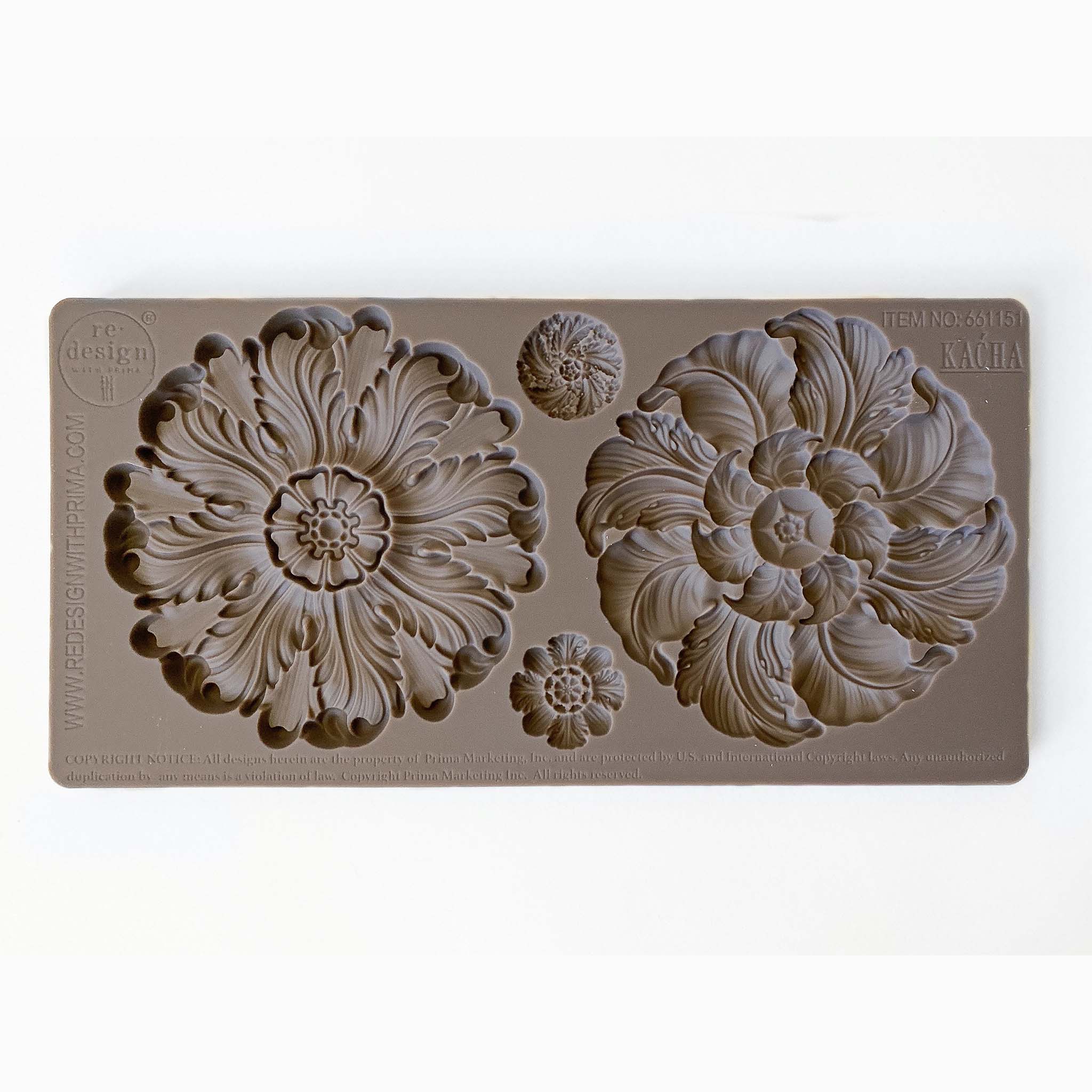 A brown silicone mold of 2 large and 2 small floral medallions is against a white background.