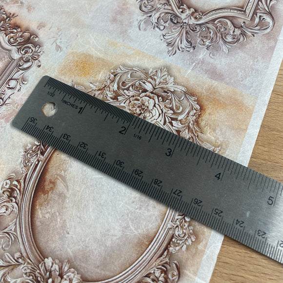 Ruler on decorative paper with intricate patterns