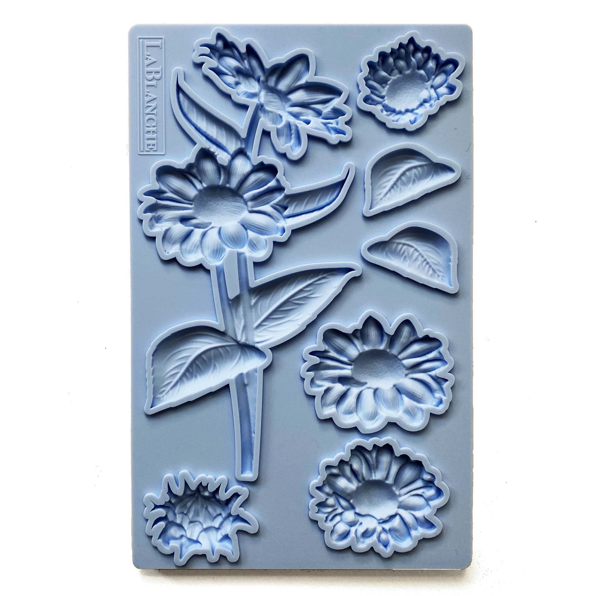 A 5" x 8" blue silicone mold of Gerbera flowers is on a white background.