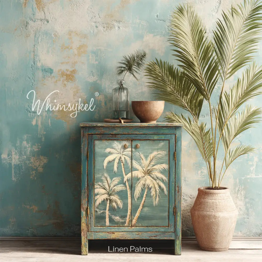 A vintage console cabinet has weathered teal blue paint and features Whimsykel's Linen Palms tissue paper on its 2 doors.
