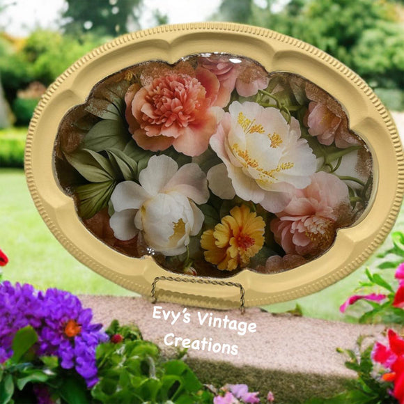 Decorative box with floral design and gold frame, featuring 'Evy's Vintage Creations' text.
