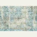 Rice paper featuring a faded light blue and cream colored fabric that has a worn damask scroll design and script writing. 
