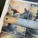 Winter-themed card with a snowman and cardinal, ruler for scale