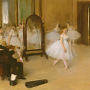 Close-up of a rice paper featuring a stunning painting by Degas of ballerinas warming up in a spacious studio.