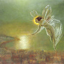 Close-up of a rice paper featuring a green night scene of a fairy with sheer wings and dress flying over a watercolor cityscape.