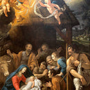 Close-up of a rice paper featuring Mary, Joseph, and baby Jesus surrounded by angels and villagers. 