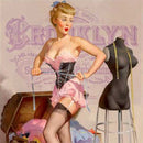 Close-up of a rice paper that features a playful image of a woman cinching her black corset next to a dress form and chest full of clothes.