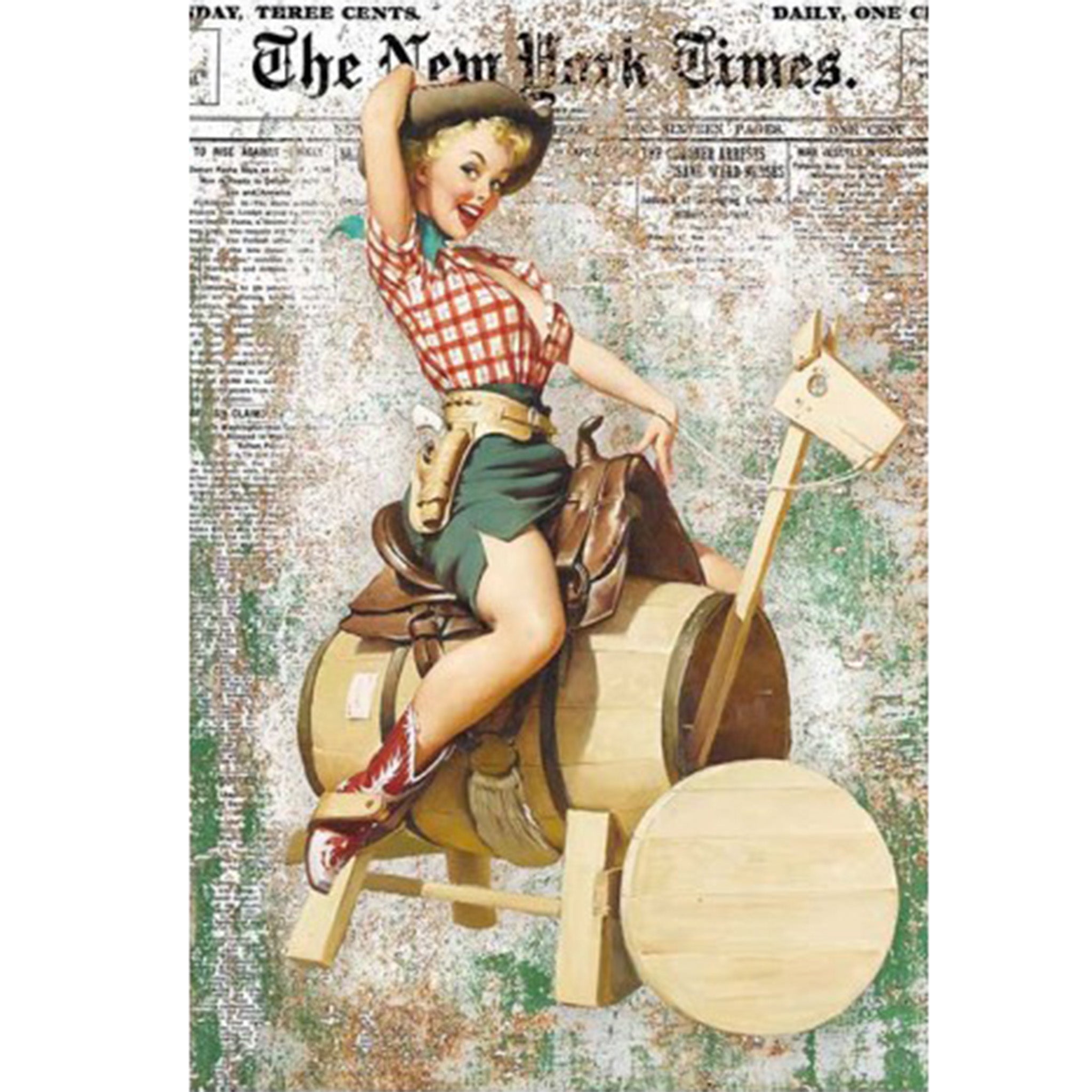 Rice paper design featuring  a fun pinup cowgirl riding a wooden barrel horse against a vintage page of The New York Times. White borders are on the sides.