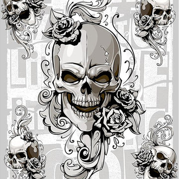 Close-up of a rice paper featuring a grey scale design of skulls and roses against scrolling flourishes with a touch of block text as the backdrop. 