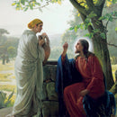 Close-up of a rice paper featuring a woman at a well meeting a kneeling Jesus.