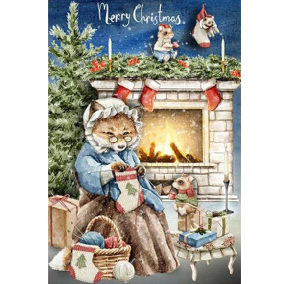 Full sheet of 'Knitted With Love' decoupage paper from Paper Designs Italy, showing a festive woodland Christmas scene with a fox knitting by the fire, stockings on the mantle, presents under a tree, and the words 'Merry Christmas' written above.