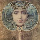 Close-up of a rice paper featuring a woman’s face reflected inside an ornate gold hand mirror against a grungy brown background.