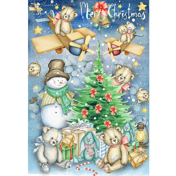 Rice paper featuring adorable teddy bears and a snowman gathered around a snowman by a Christmas tree and teddy bears in cardboard airplanes all against a winter blue background with stars.
