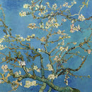 Close-up of a rice paper featuring a beautiful blue background with twisting branches and blooming flowers.