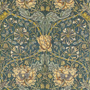 Close-up of a rice paper featuring a vintage green and creamy yellow floral print against a dark blue background that's giving major retro tapestry vibes.