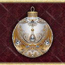 Decorative Christmas ornament with gold and white design on a red patterned background