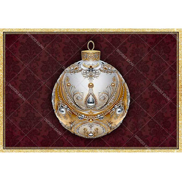 Decorative Christmas ornament with gold and silver details on a red patterned background