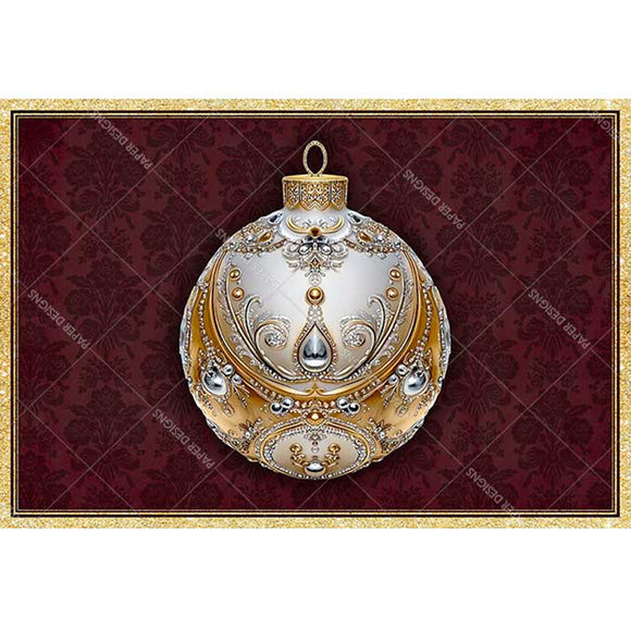Decorative Christmas ornament with gold and silver details on a red patterned background