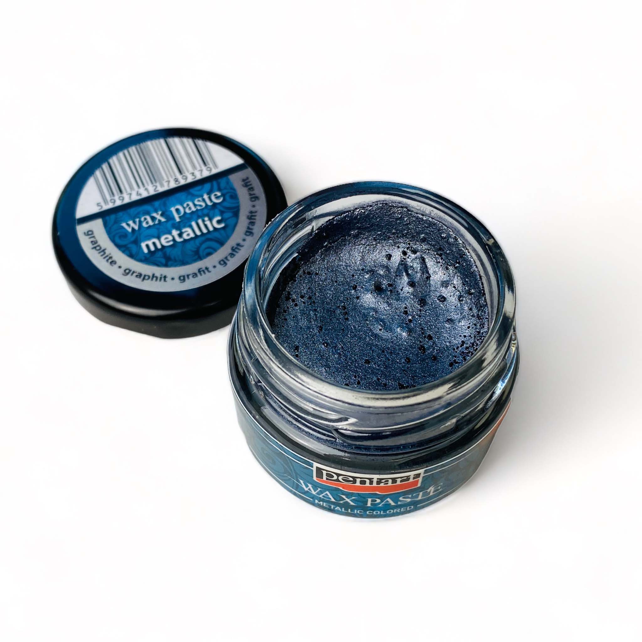 An open jar of a 20ml/0.68 ounce jar of metallic Graphite wax paste by Pentart is against a white background.
